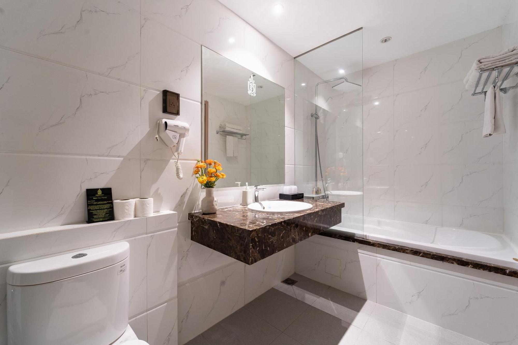 Nicecy Hotel Suites & Spa Ciudad Ho Chi Minh  Habitación foto